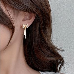 Gorgeous rhinestone bow dangle earrings